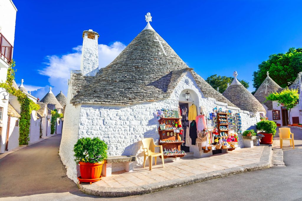Alberobello, Typical houses built with dry stone walls and conical roofs. Apulia