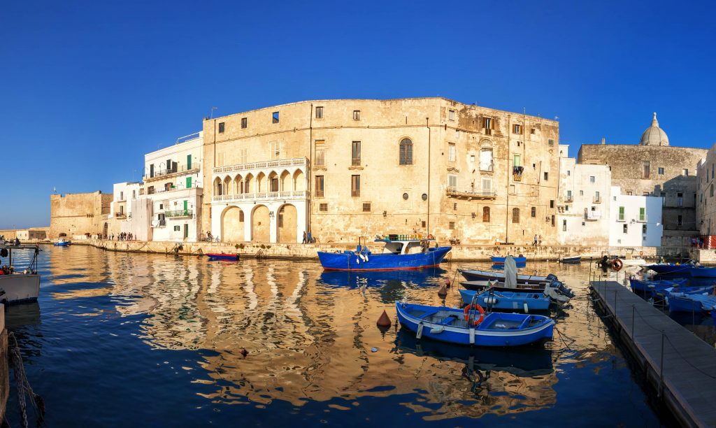 Old port of Monopoli province of Bari, region of Apulia, southern Italy. Boats in the marina of Monopoli.